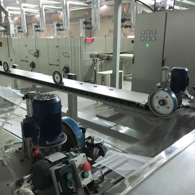Tensionless stenter machine configurations for mosquito net processing